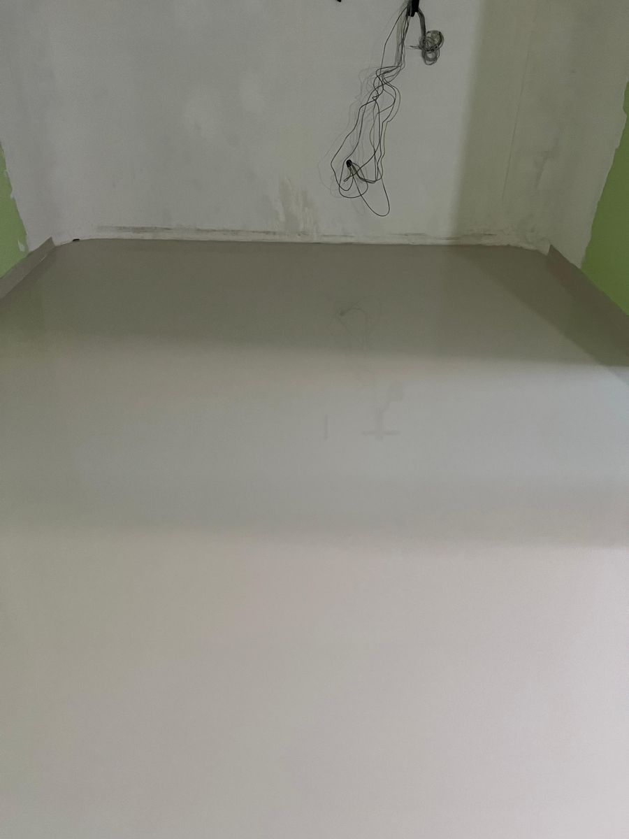 HDB bedroom homogeneous tiles after grinding stage